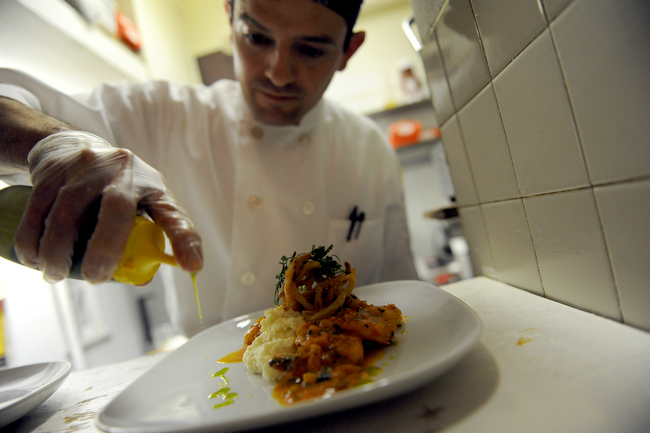 Chef Jackson dresses the plump and satisfying shrimp and grits.